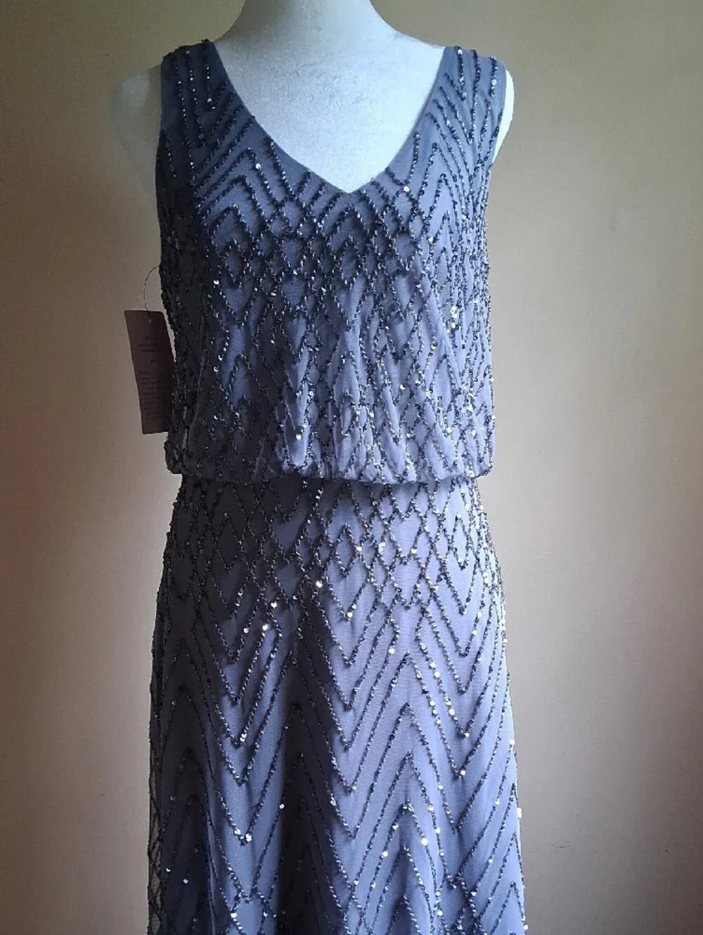 Elegant, Beaded V- shaped Neck Line